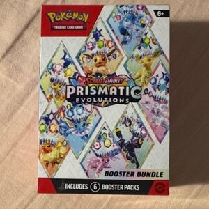 Pokemon Prismatic Evolutions Booster Bundle - Red, Blue, Yellow